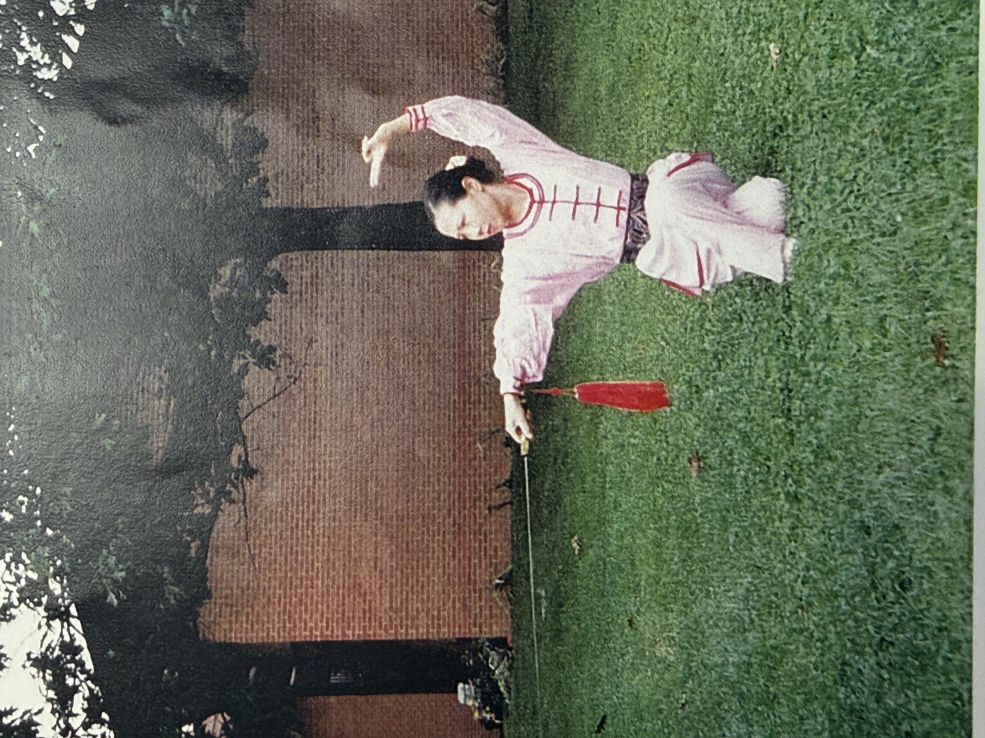Dr. Chi practicing Tai Chi with sword